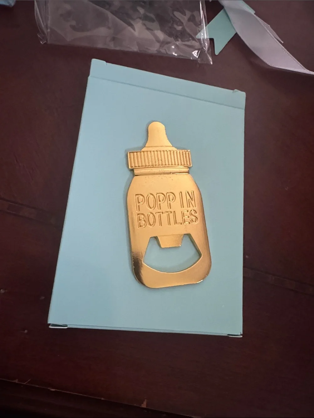Amazon Aqua Favor Boxes with White Ribbon and Gold Baby Bottle Opener